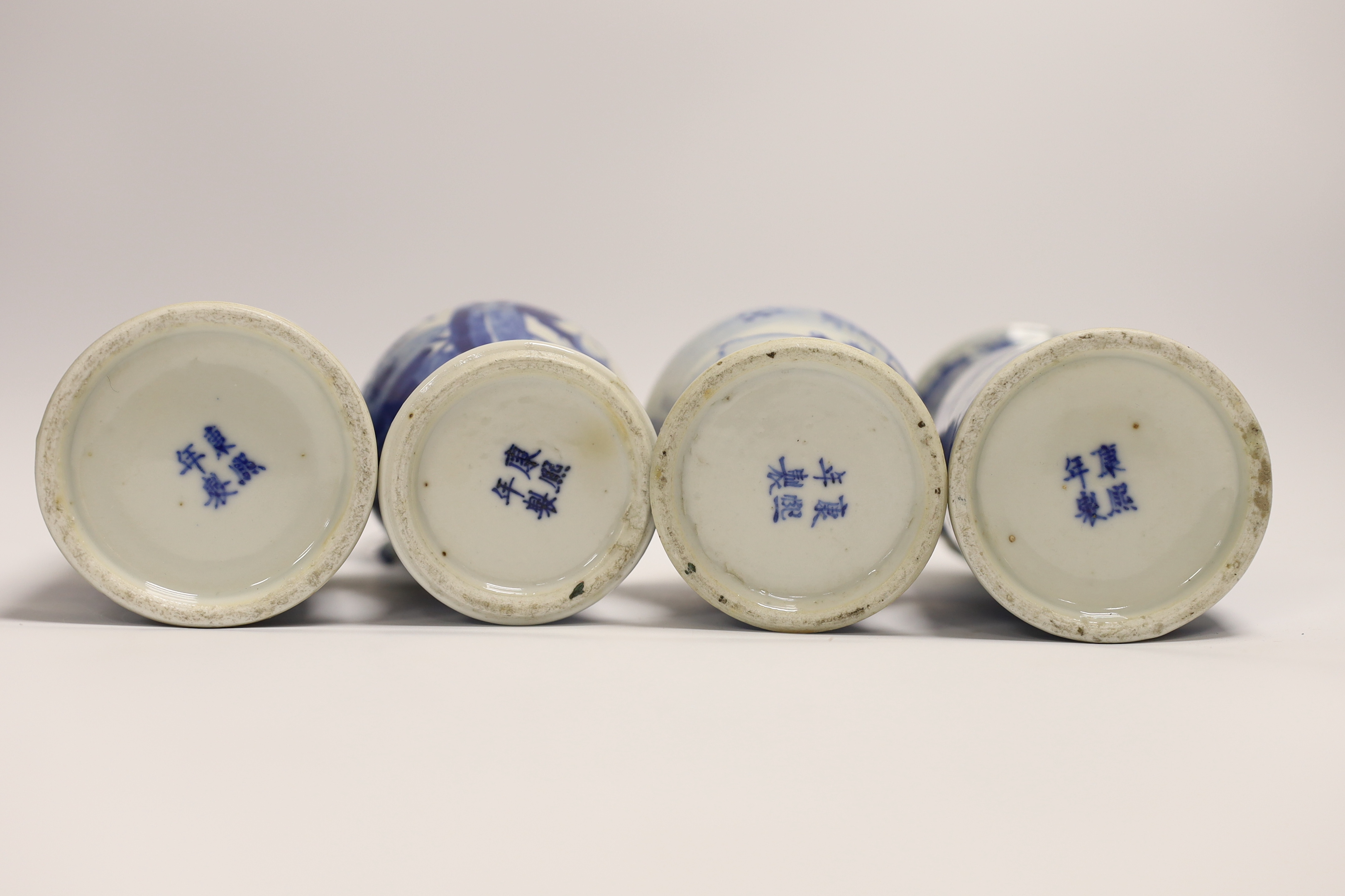 A pair of early 20th century Chinese blue and white sleeve vases and two others, one cover, tallest 21cm